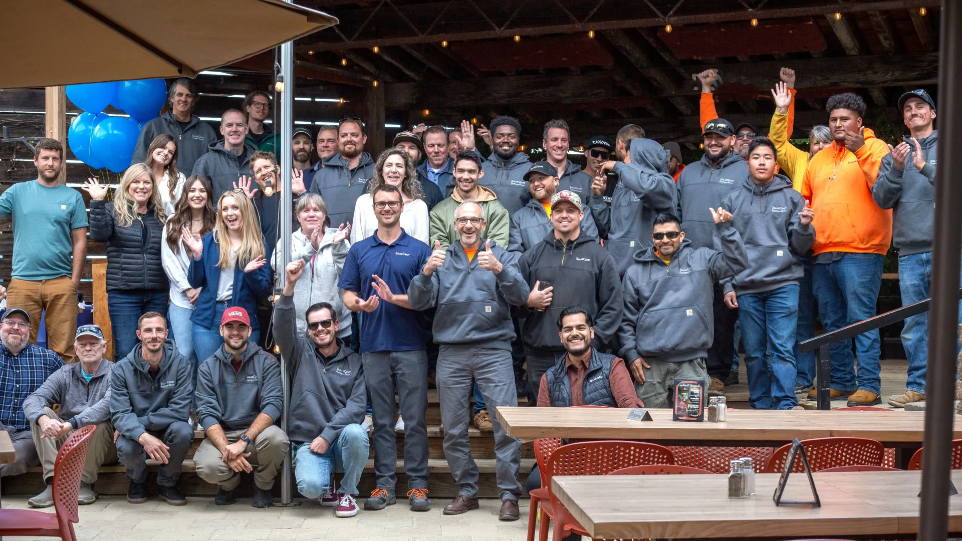 a group of people posing for a photo