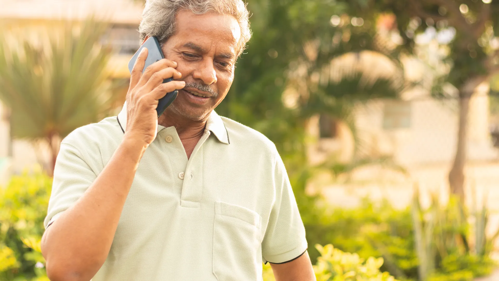 a man talking on a cell phone