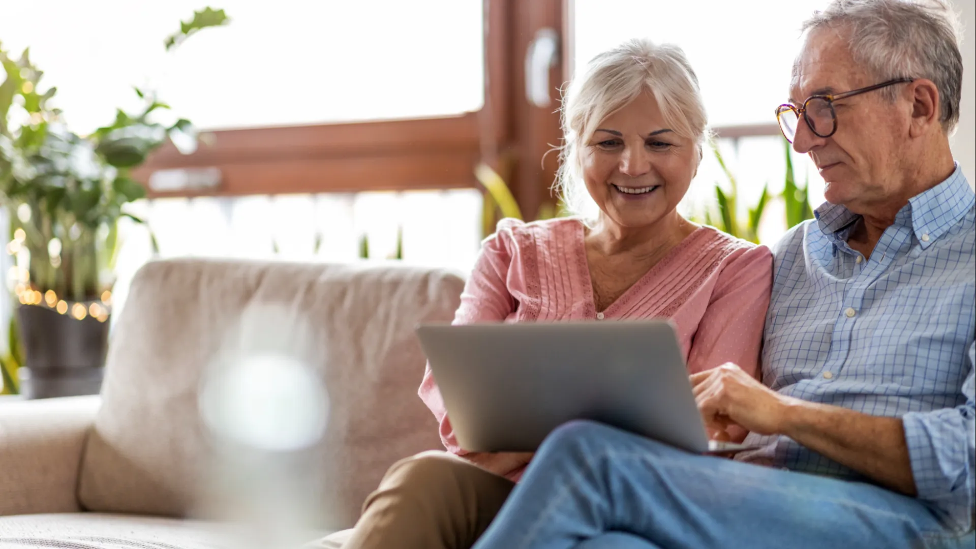 a man and a woman sitting on a couch