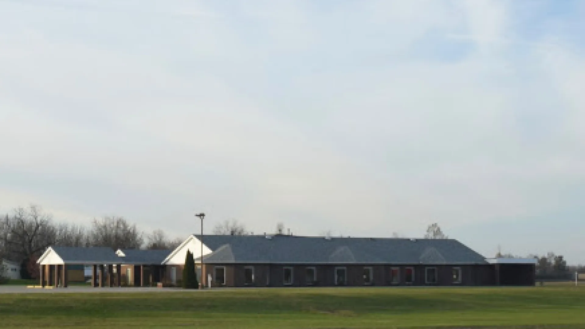 a house with a grass field