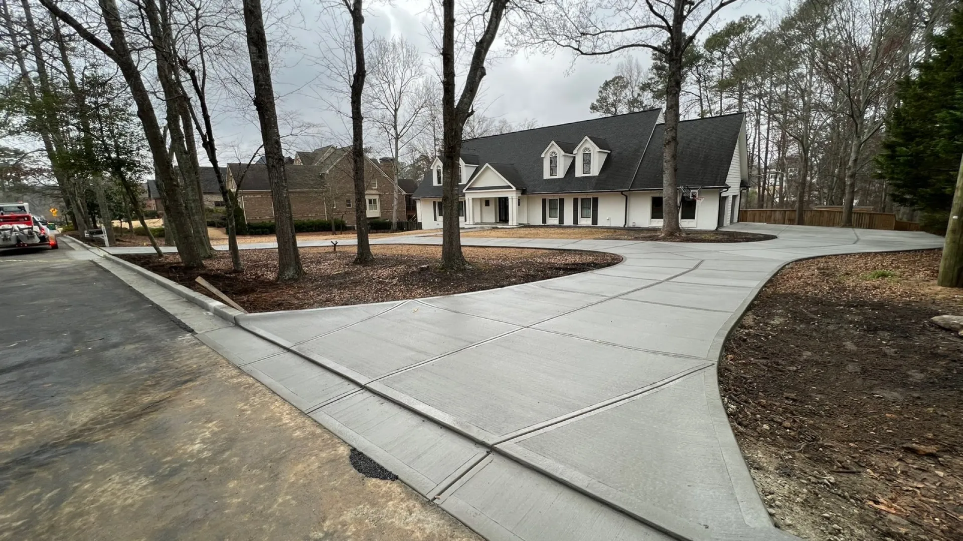 a road with a building on the side