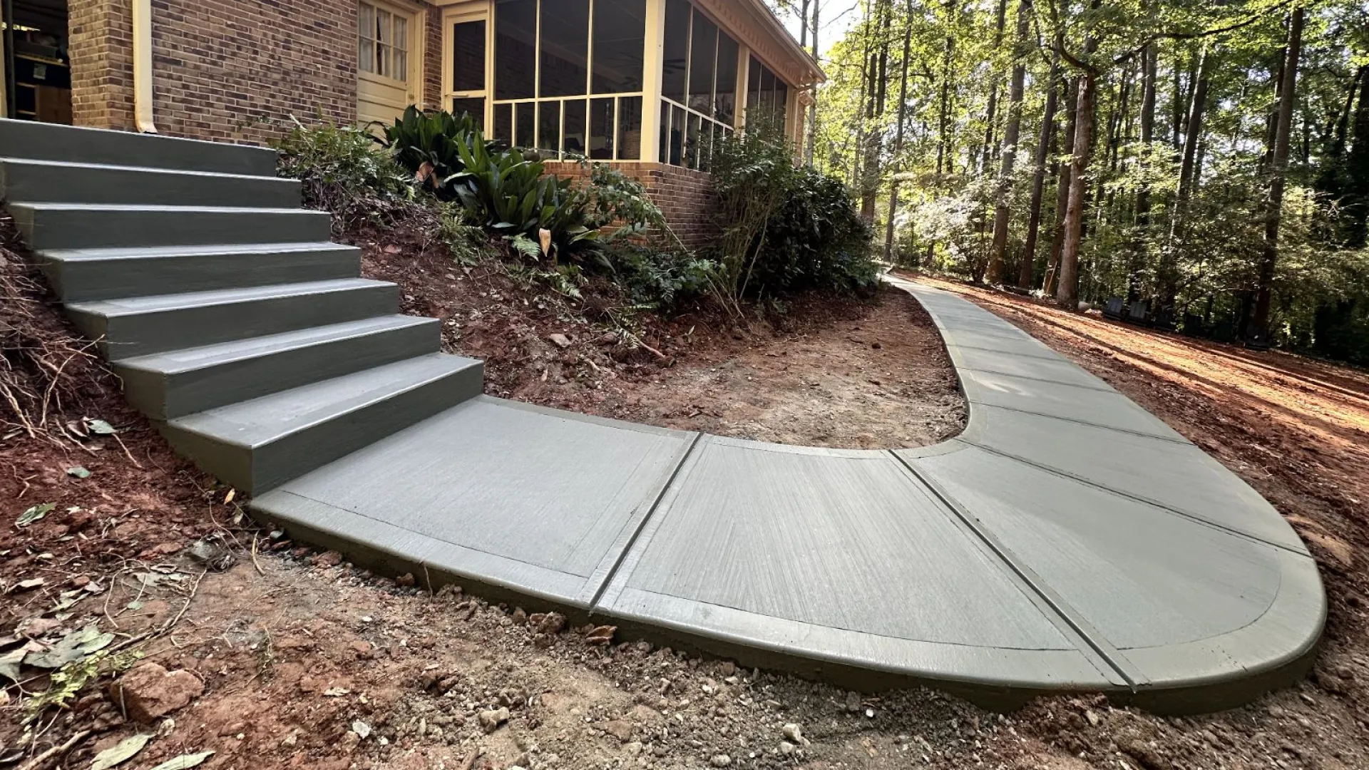 Brand new pathway with staircase add accessibility and functionality around the home to backyard.