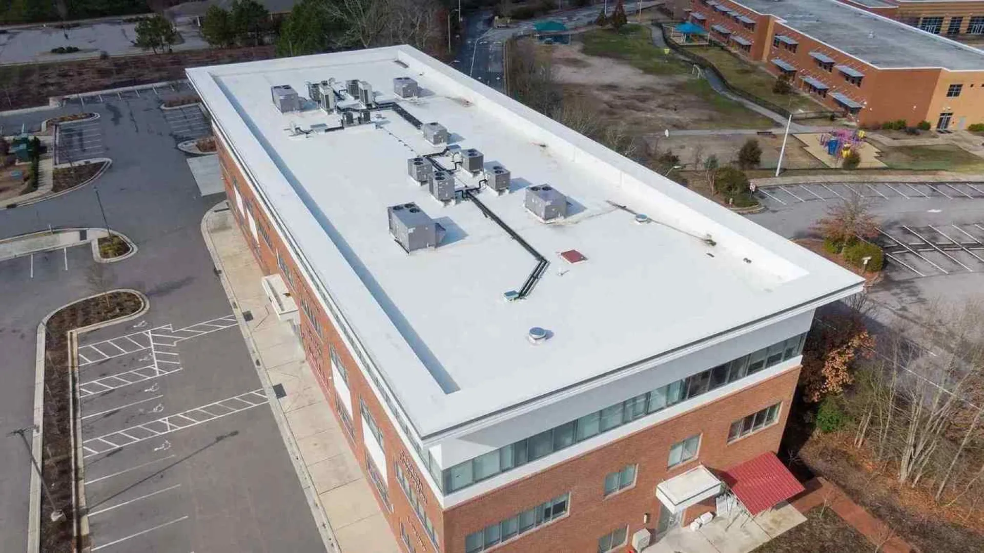 Atlanta Commercial Building Exterior Painting & Siding Repairs