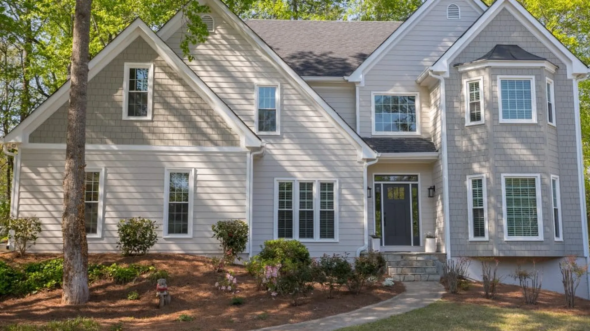 a large house with a driveway