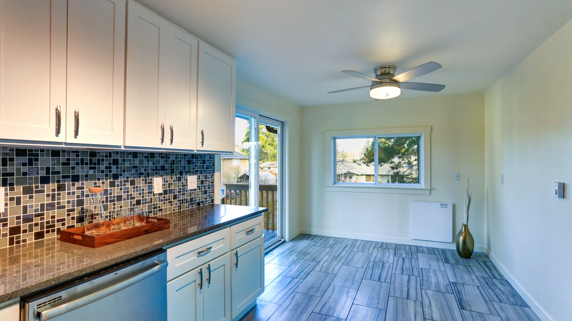 a kitchen with a tile floor