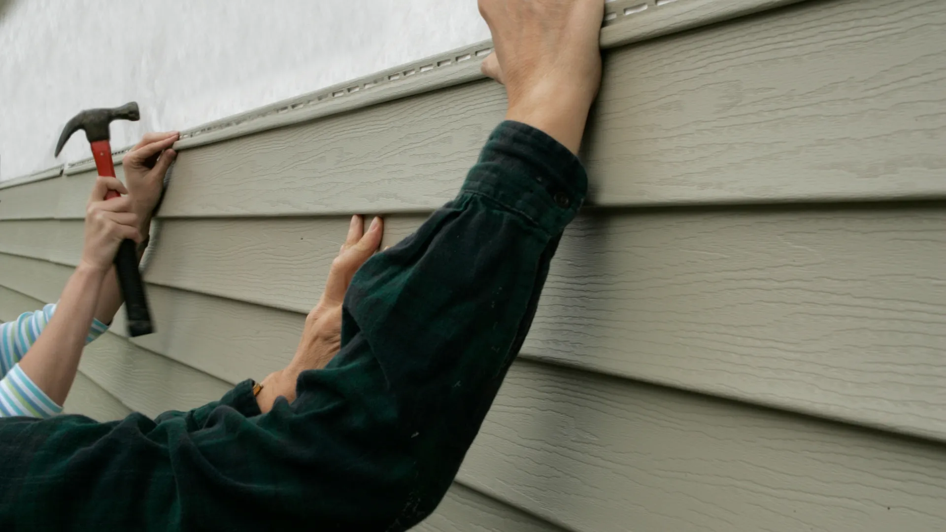 a man holding a hammer