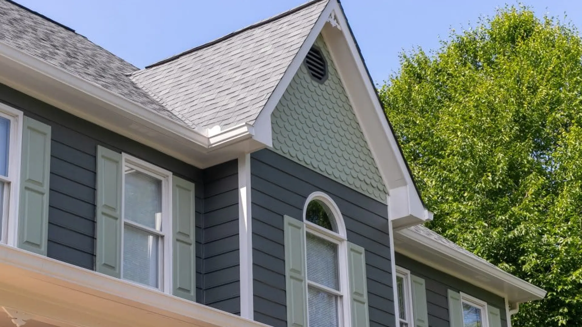 a house with a tree in the front