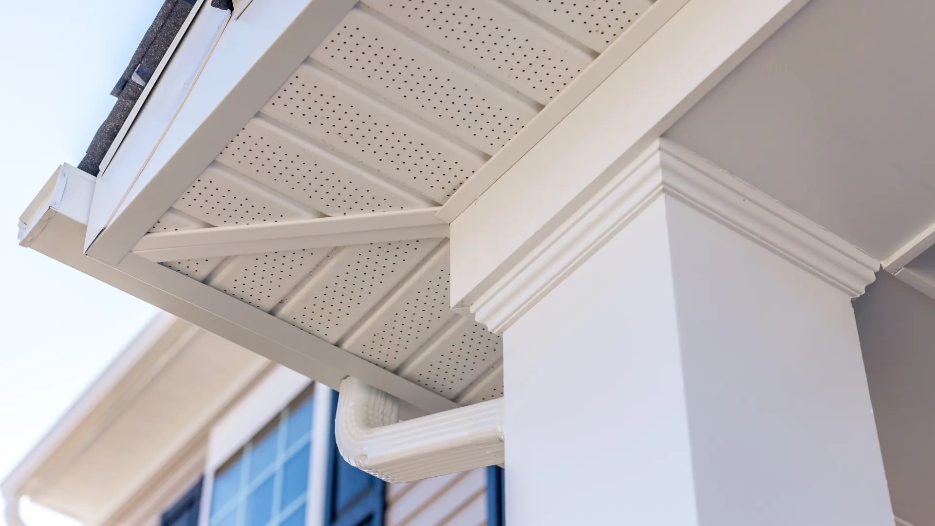 a white ceiling with a vent