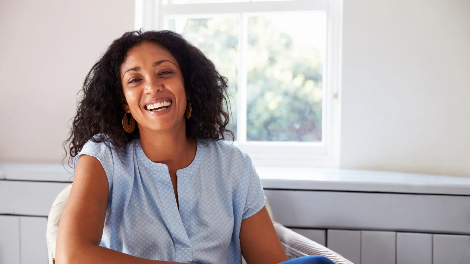 a woman smiling at the camera