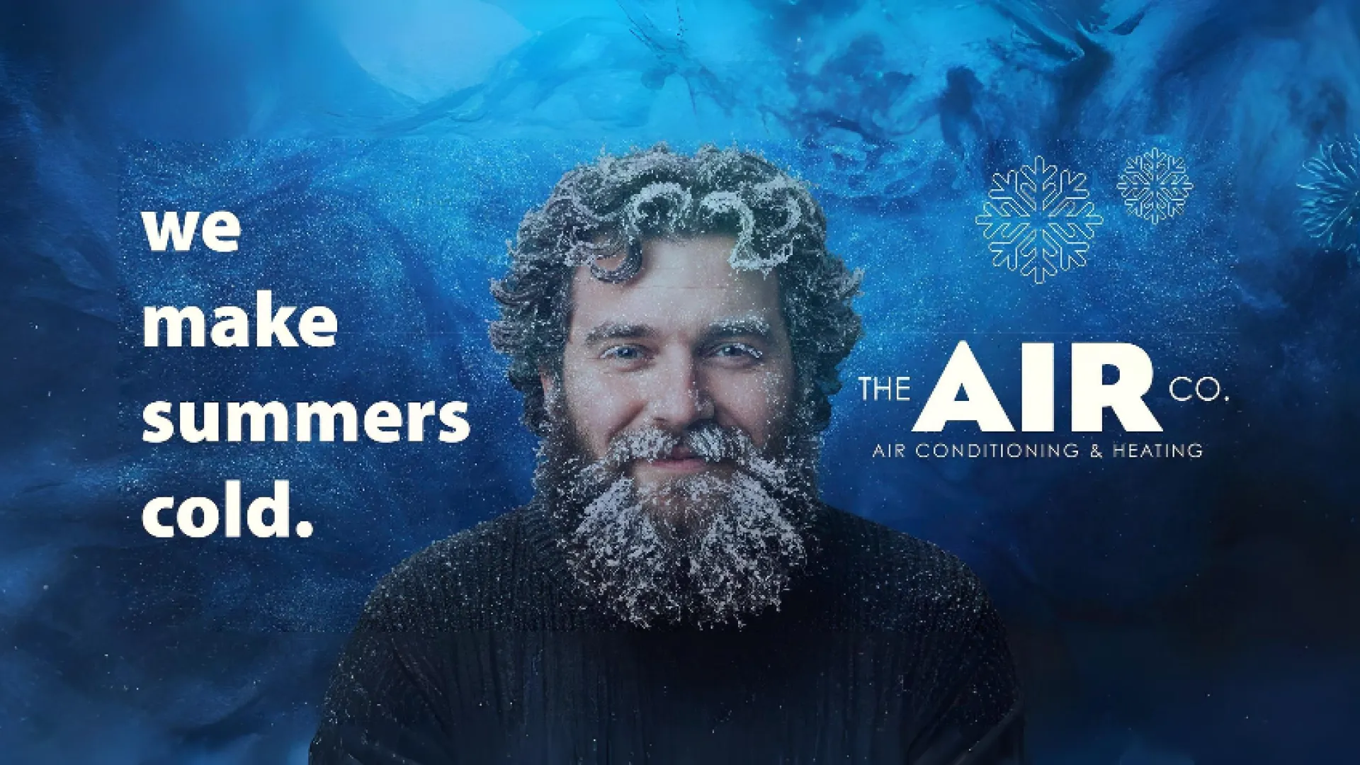 Man with frosted hair and beard in icy blue background advertising The Air Co. air conditioning and heating.