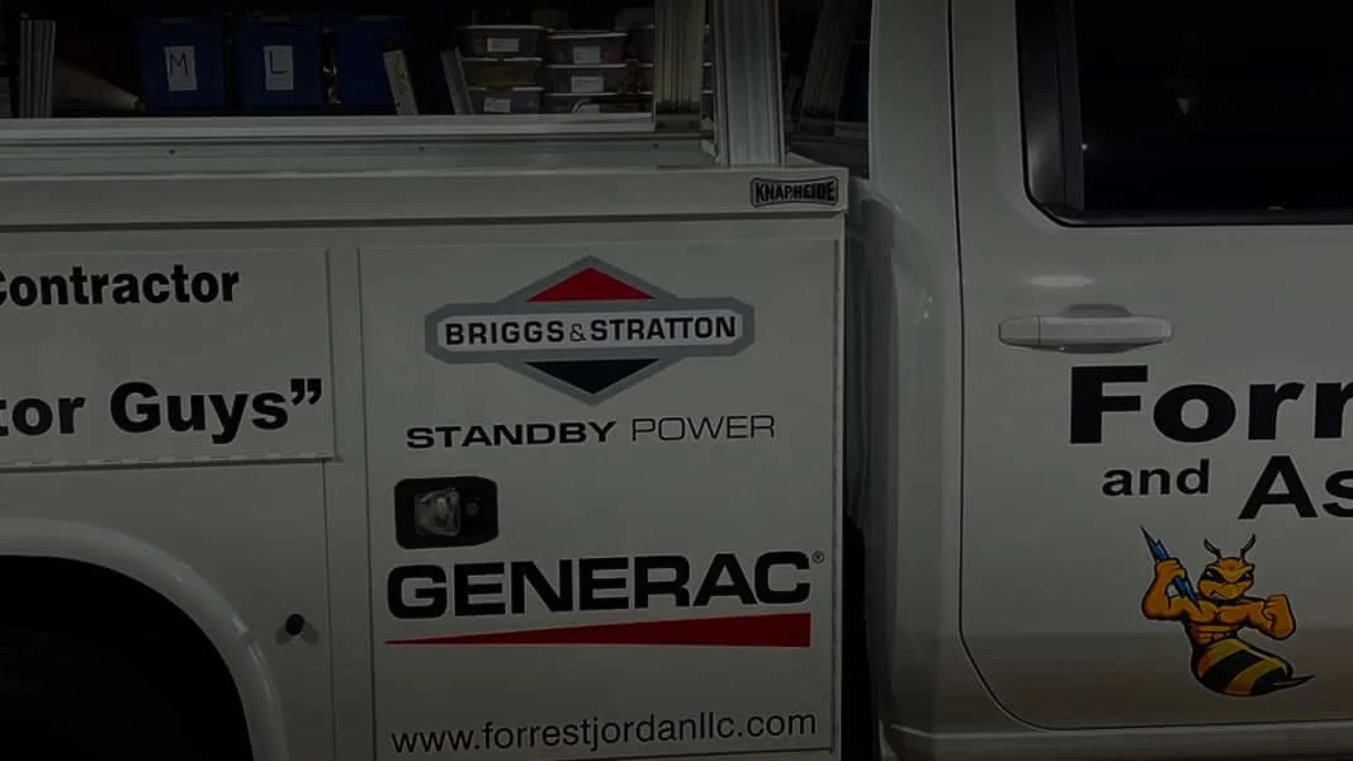 White work truck featuring branding for Forrest Jordan and Associates and Briggs & Stratton Generac.
