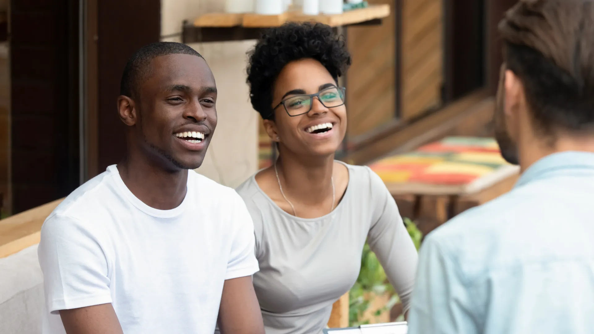 a man and a woman smiling