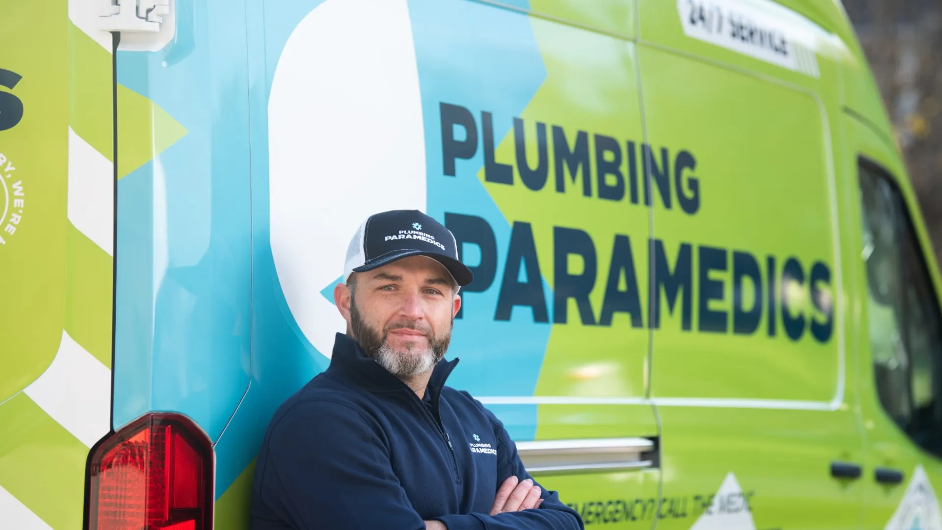 Plumbing Paramedics Denton, TX plumbing technician posing next to company van