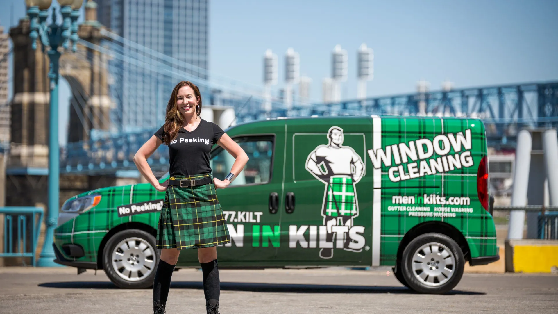franchise owner in front of service van