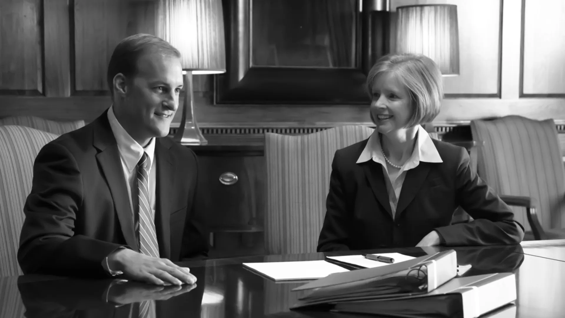 a man and a woman sitting at a table