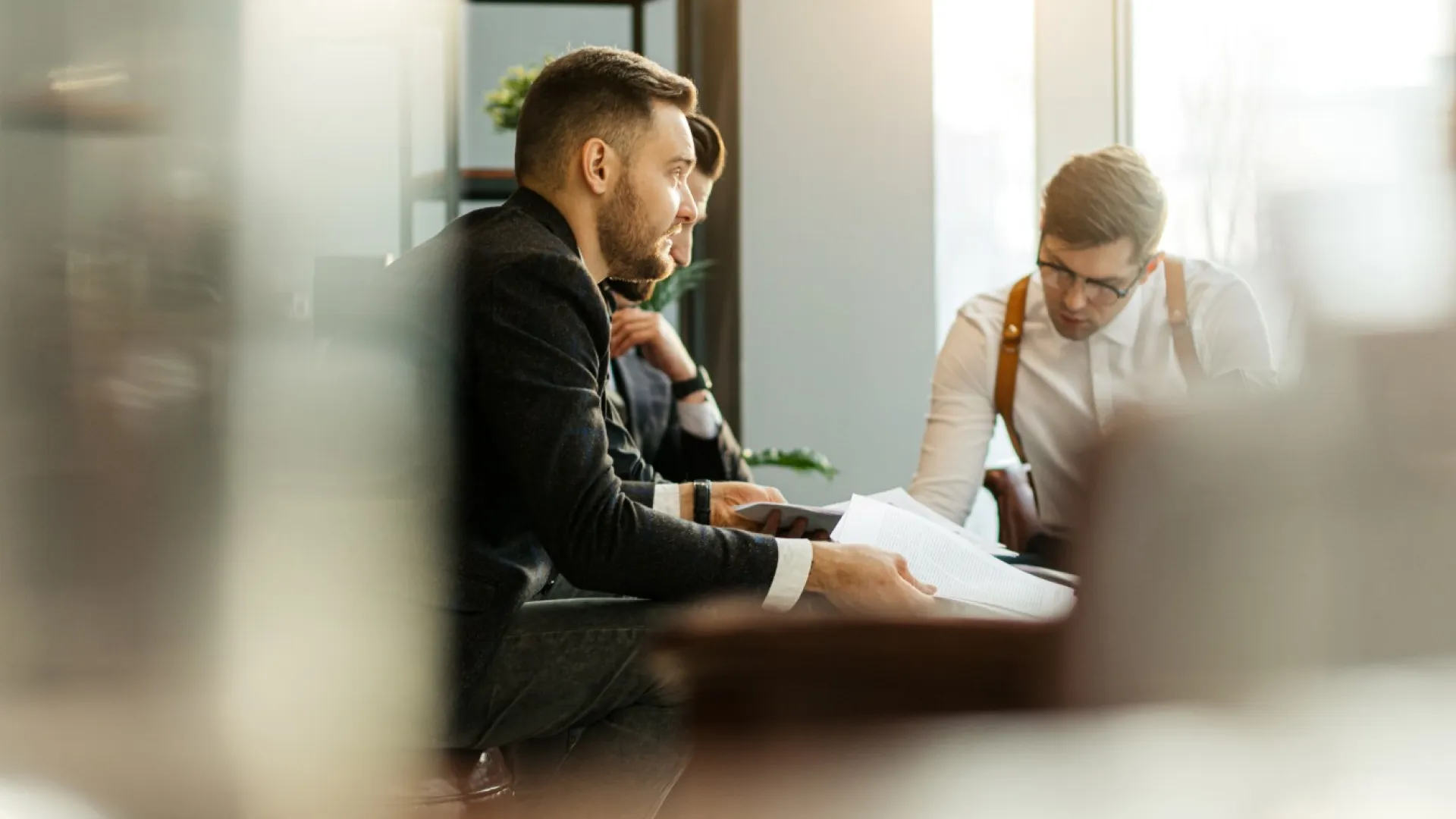 men at a meeting