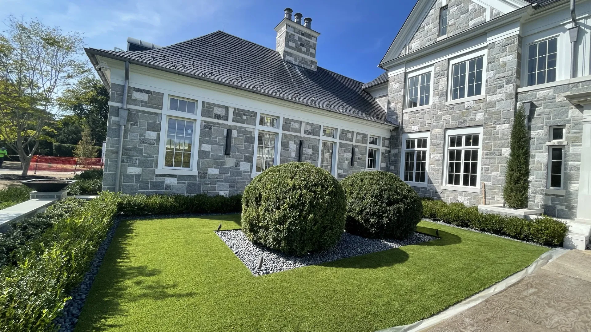 a large house with a lawn