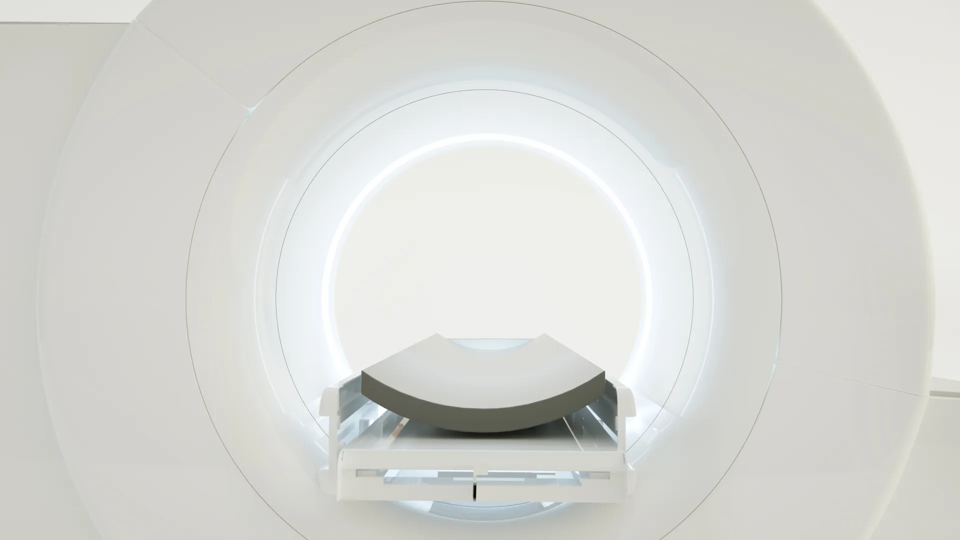 Modern MRI machine interior with a clean, minimalist design and bright lighting.