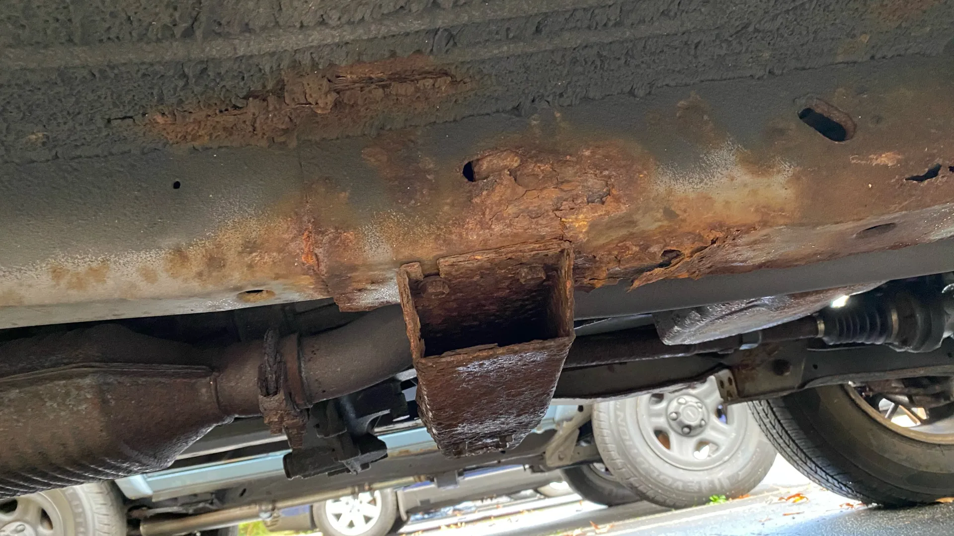 rusty undercarriage of car