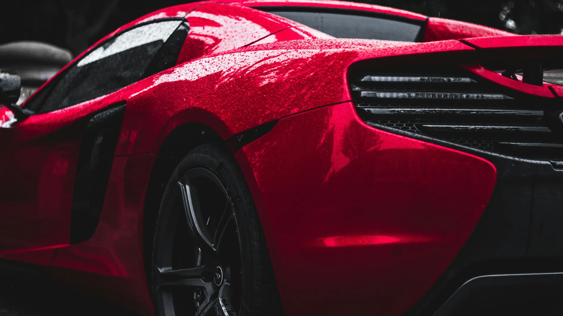 the front of a red sports car