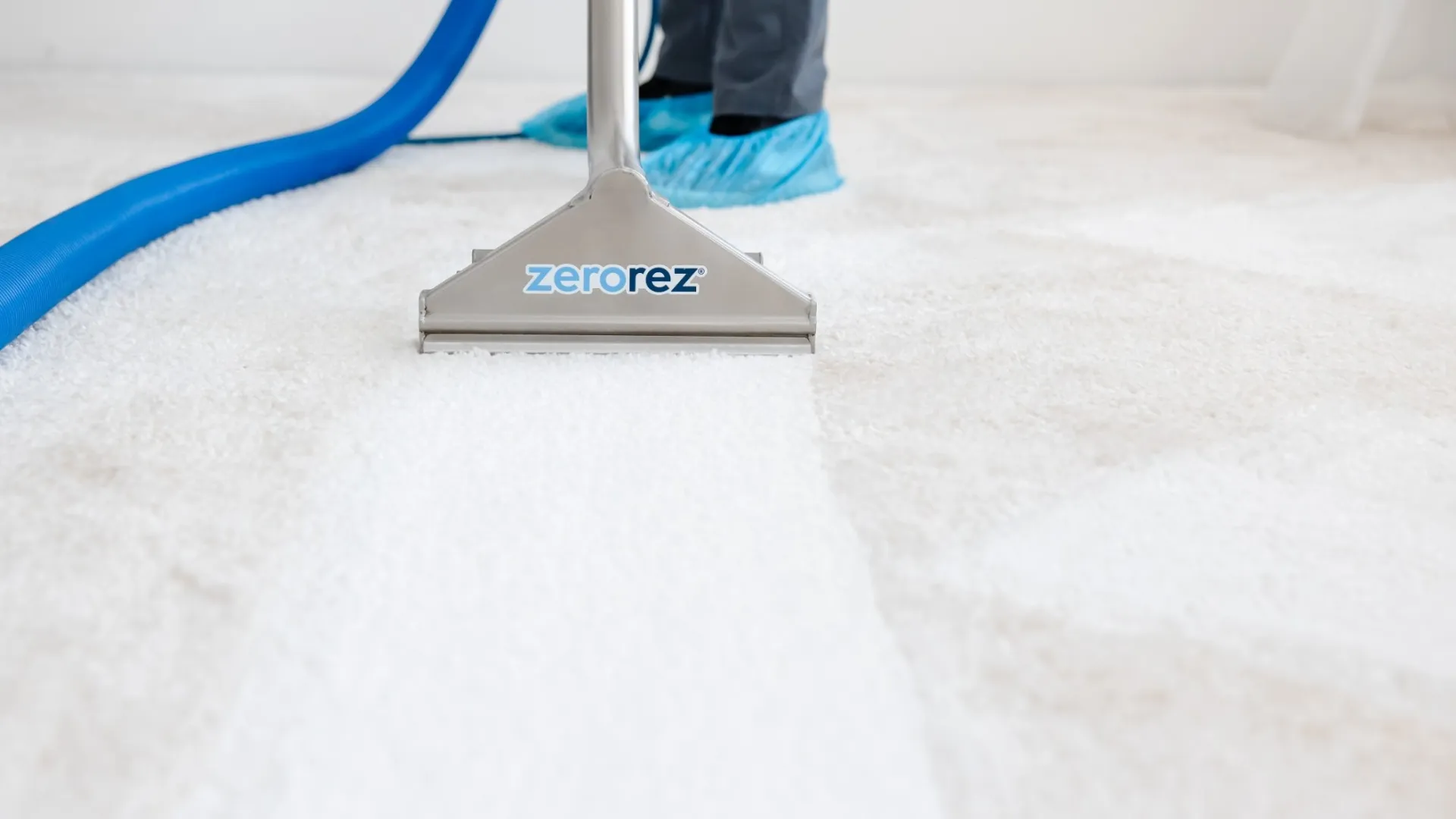 a cleaning wand on carpet