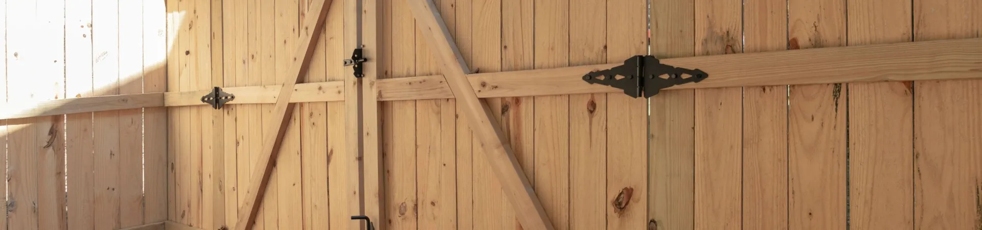 a wooden wall with a hole in it