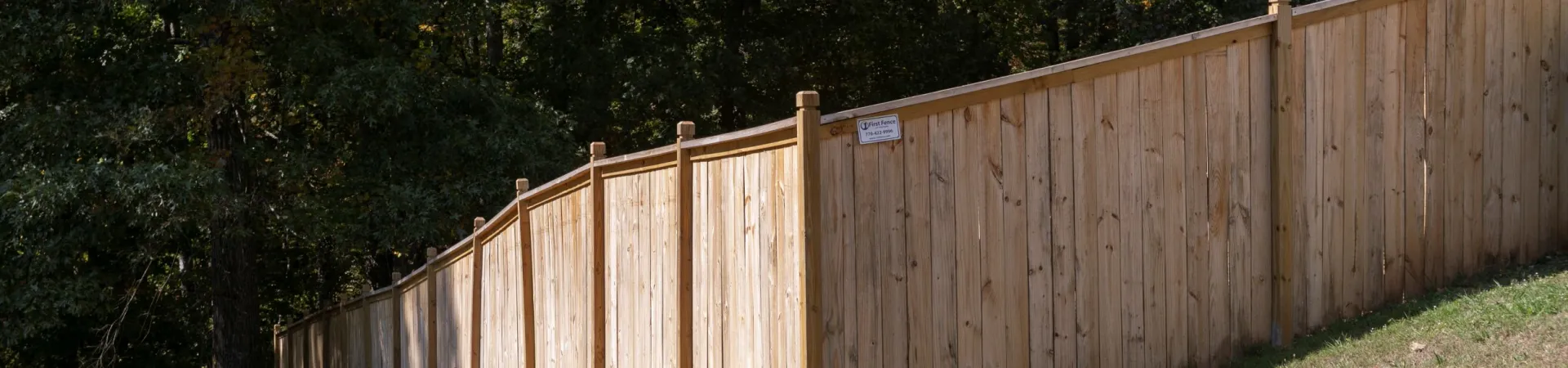 a wooden fence in a yard