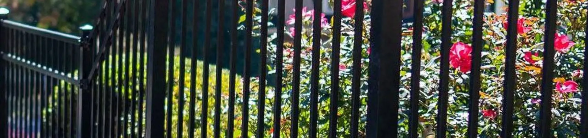 a black gate with flowers