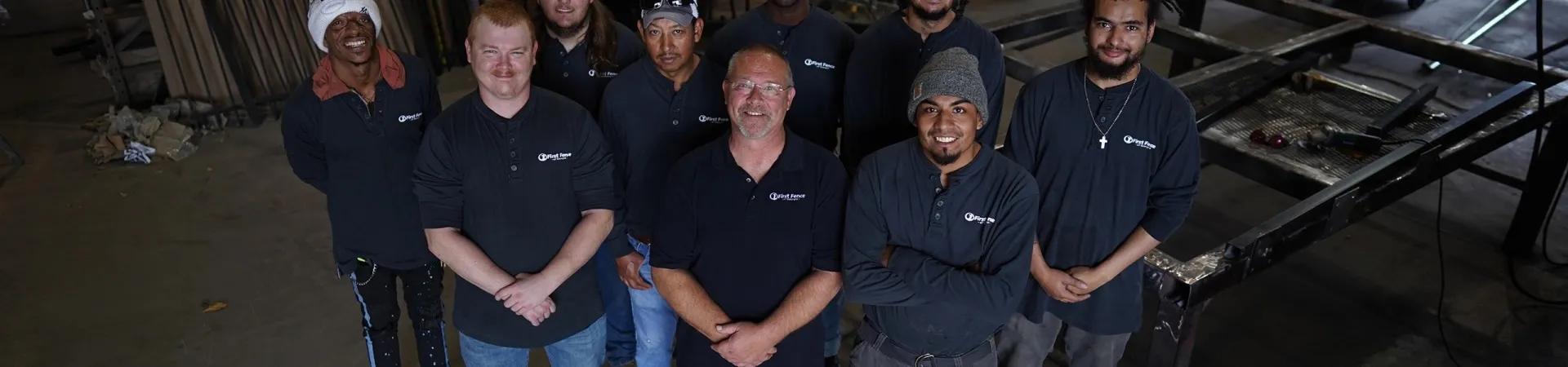 a group of men posing for a photo