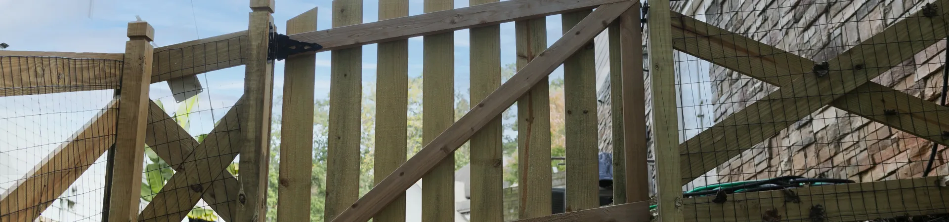 a wooden structure with a fence around it