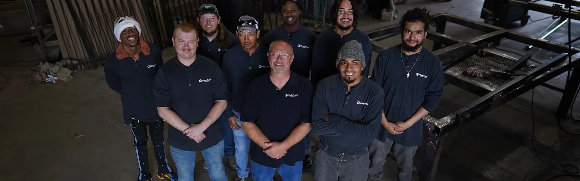 a group of men posing for a photo