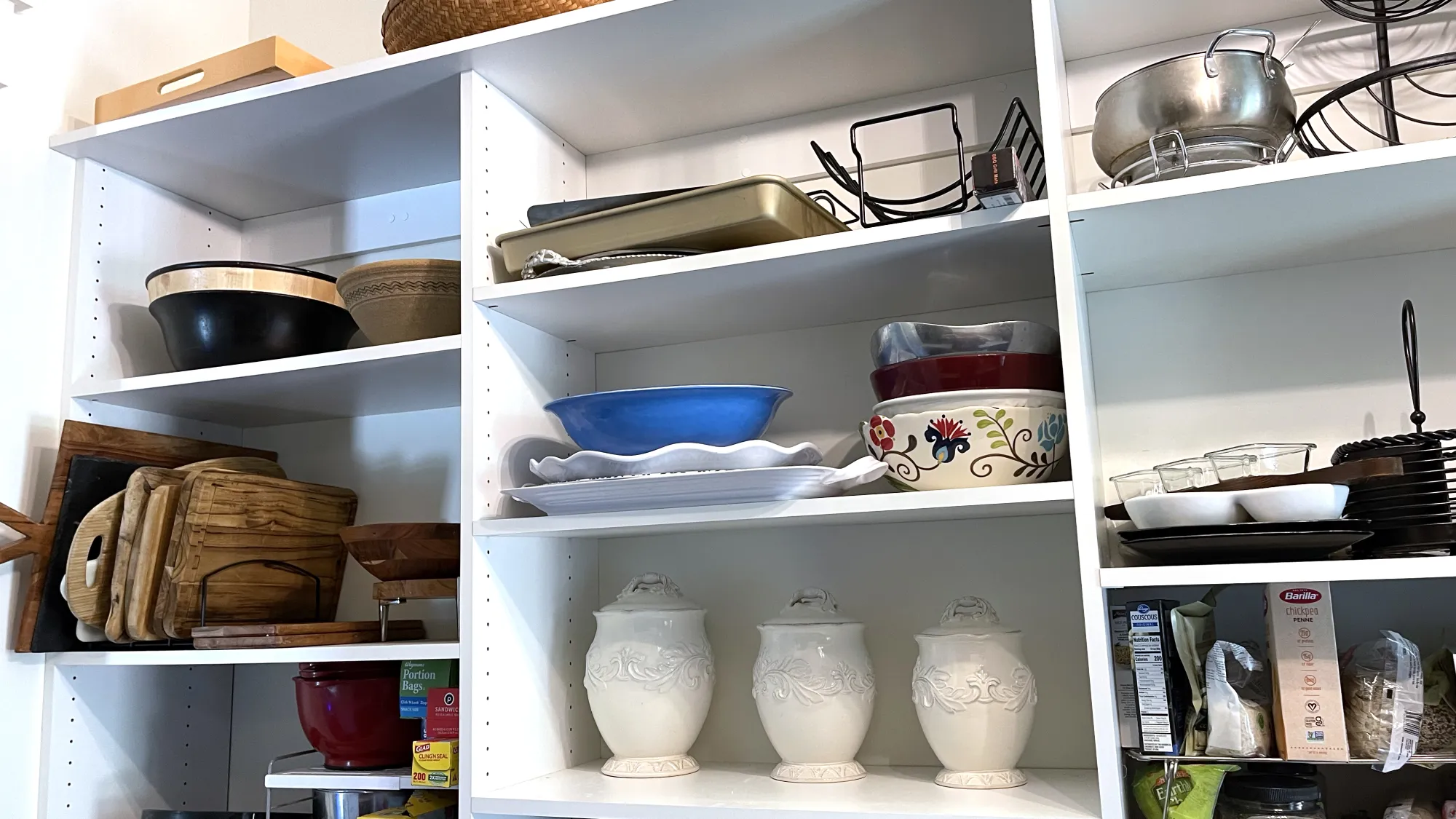 a white refrigerator with many dishes