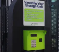 a green and white box with a sign on it