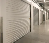 a hallway with white doors