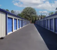 a row of white and blue containers