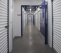 a hallway with blue doors