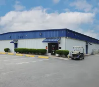 a building with a car parked in front of it