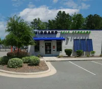 a building with a parking lot