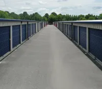 a row of white and blue metal containers