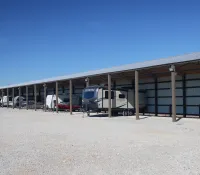 a group of vehicles parked outside a building