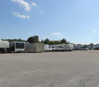 a group of trailers parked in a parking lot