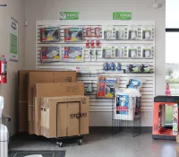 a room with shelves and boxes