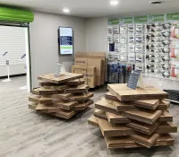 a room with shelves of boxes