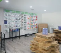 a room with shelves and boxes