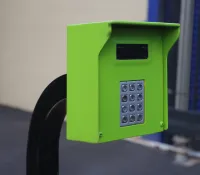 a green and black telephone