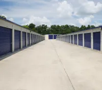 a row of blue and white garage doors