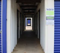 a hallway with blue doors