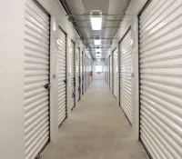 a long hallway with white walls