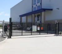 a building with a black fence