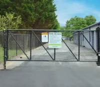 a gate with a sign on it